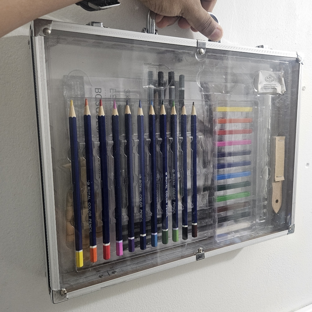 Opened Art kit - Colored Pencils, Pastels, Pencils, manican and sketch book